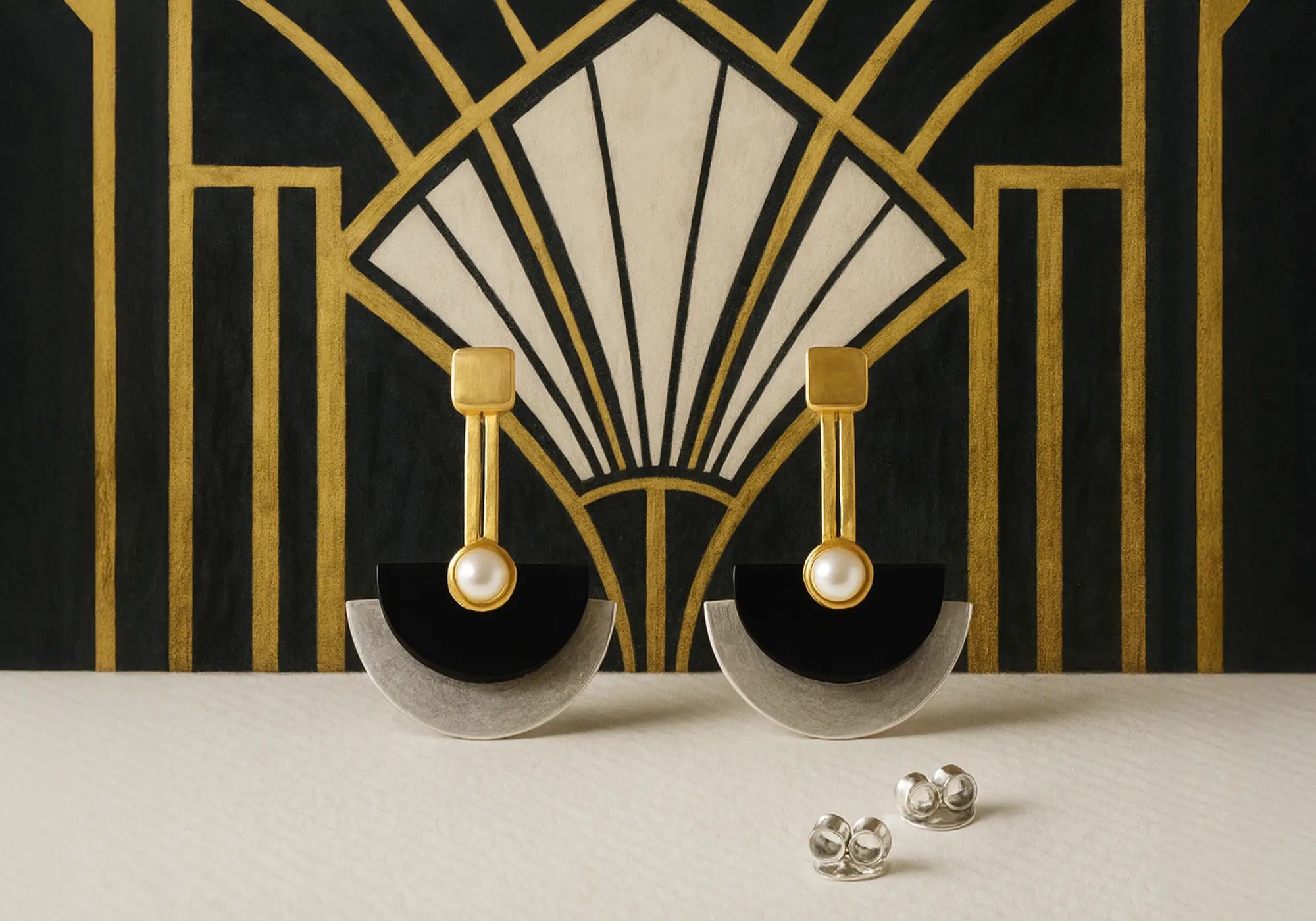 Handcrafted Art Deco design semi-circle earrings in sterling silver with gold-plated accents and pearl, vintage-inspired jewellery designed by Paula Bolton