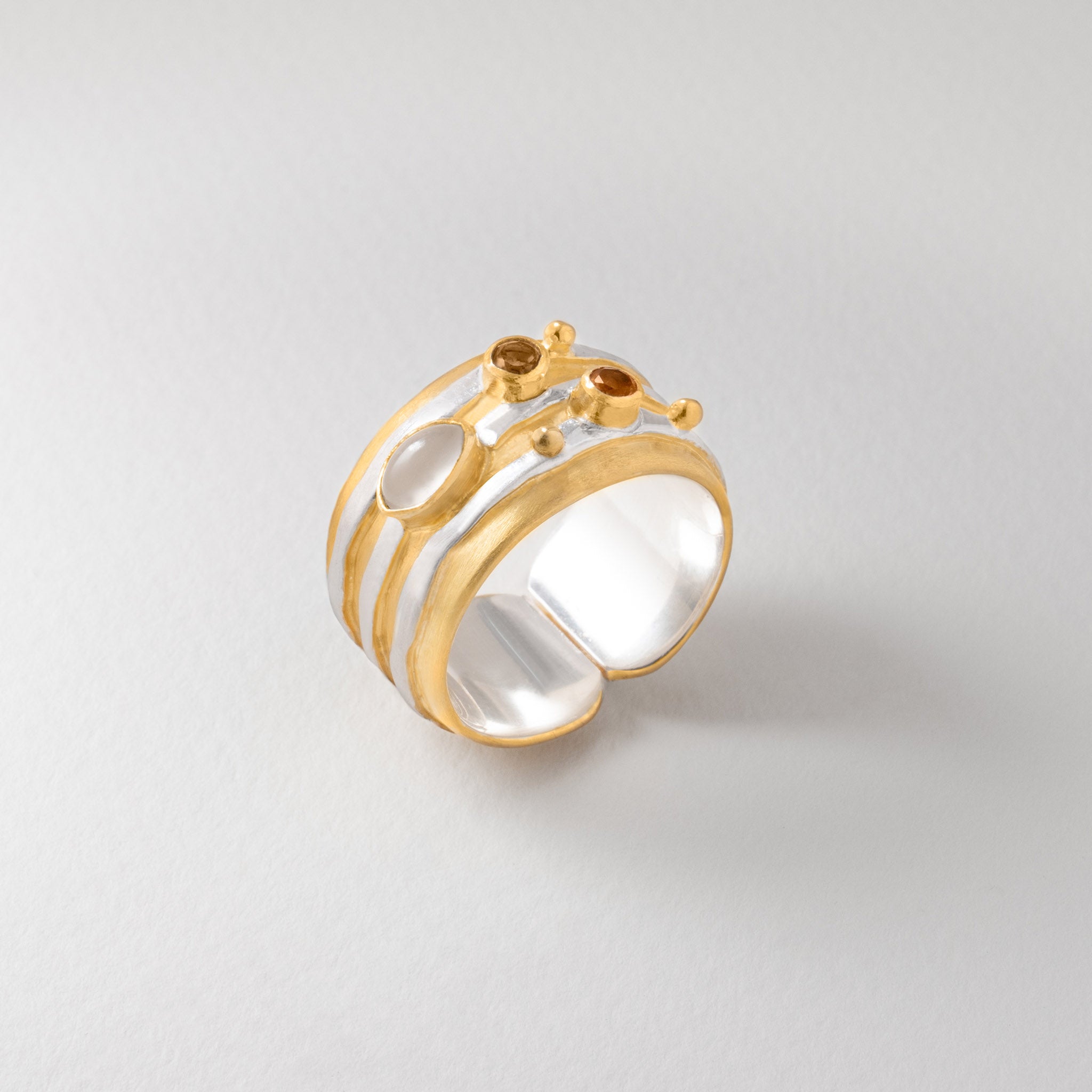 Sterling silver and gold-plated Jupiter ring featuring luminous moonstone and citrine.