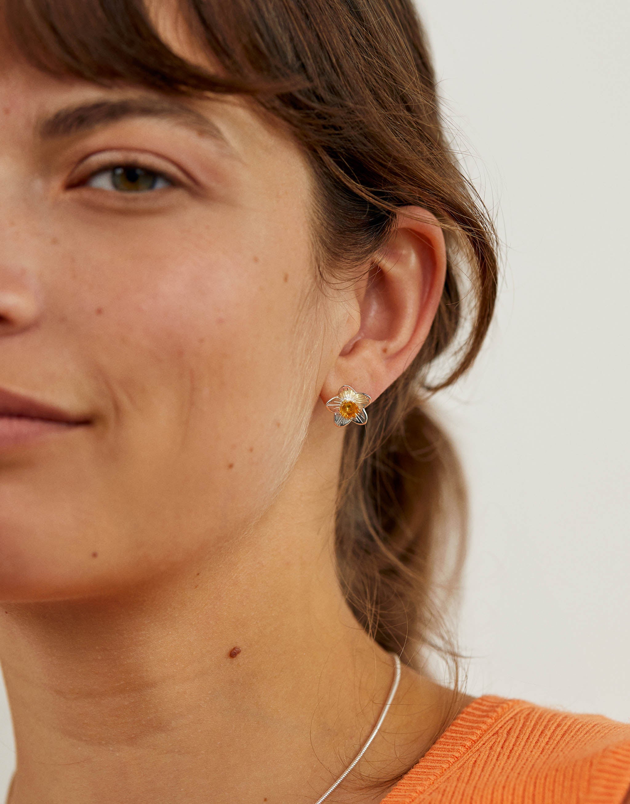 Daffodil stud earrings handmade in sterling silver and 18 carat gold plate