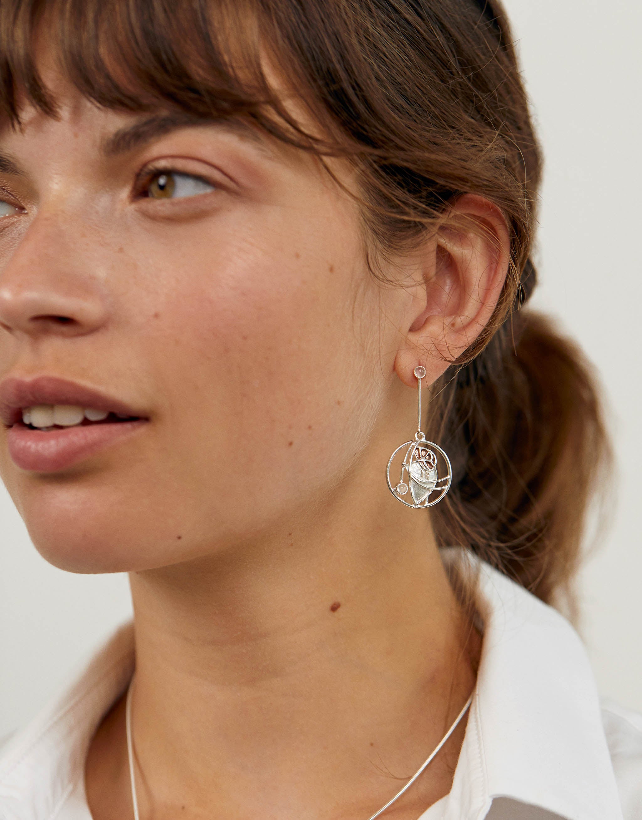 Charles Rennie drop earrings in sterling silver.