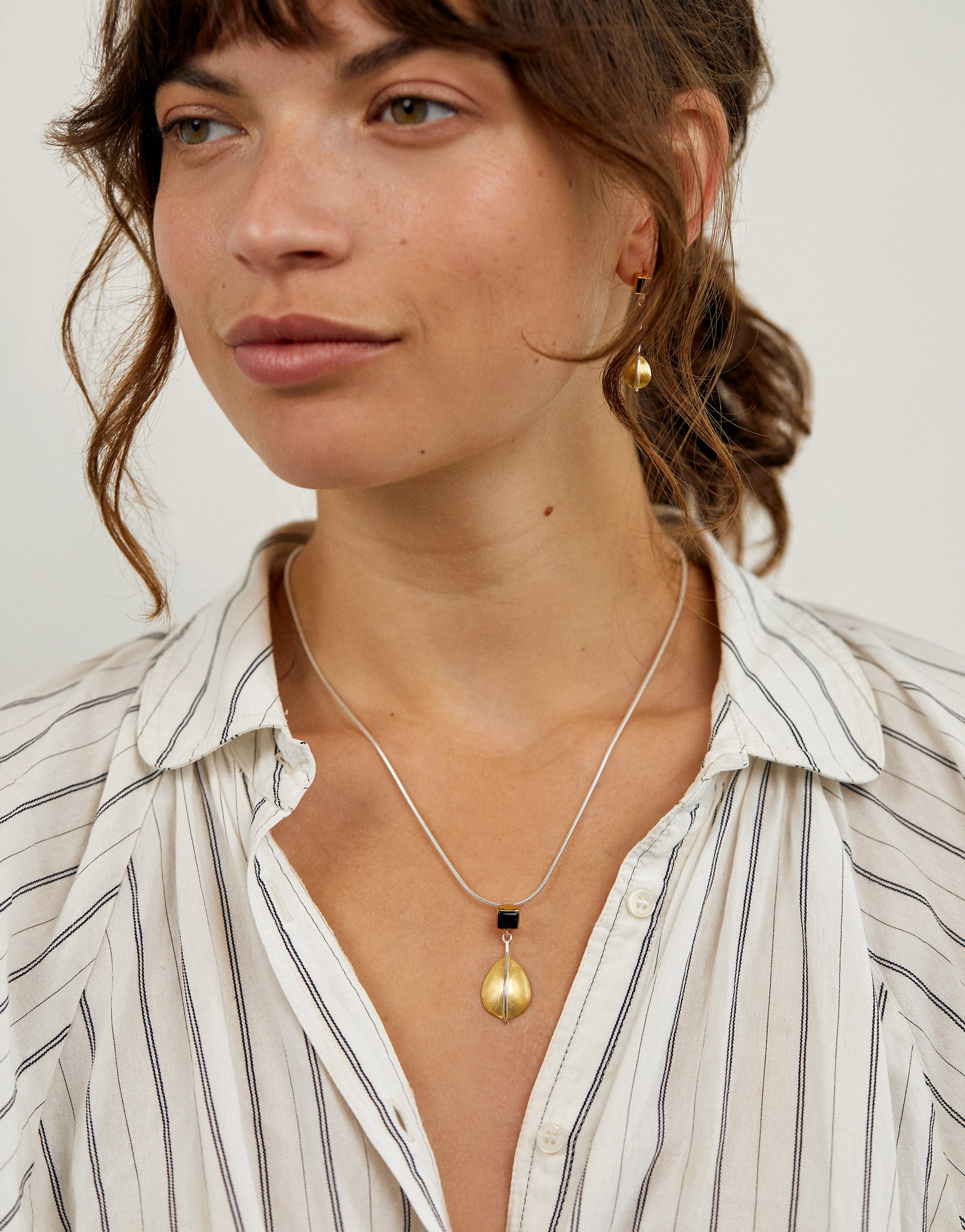 Hoffmann inspired pendant necklace in sterling silver, gold plate and black onyx.