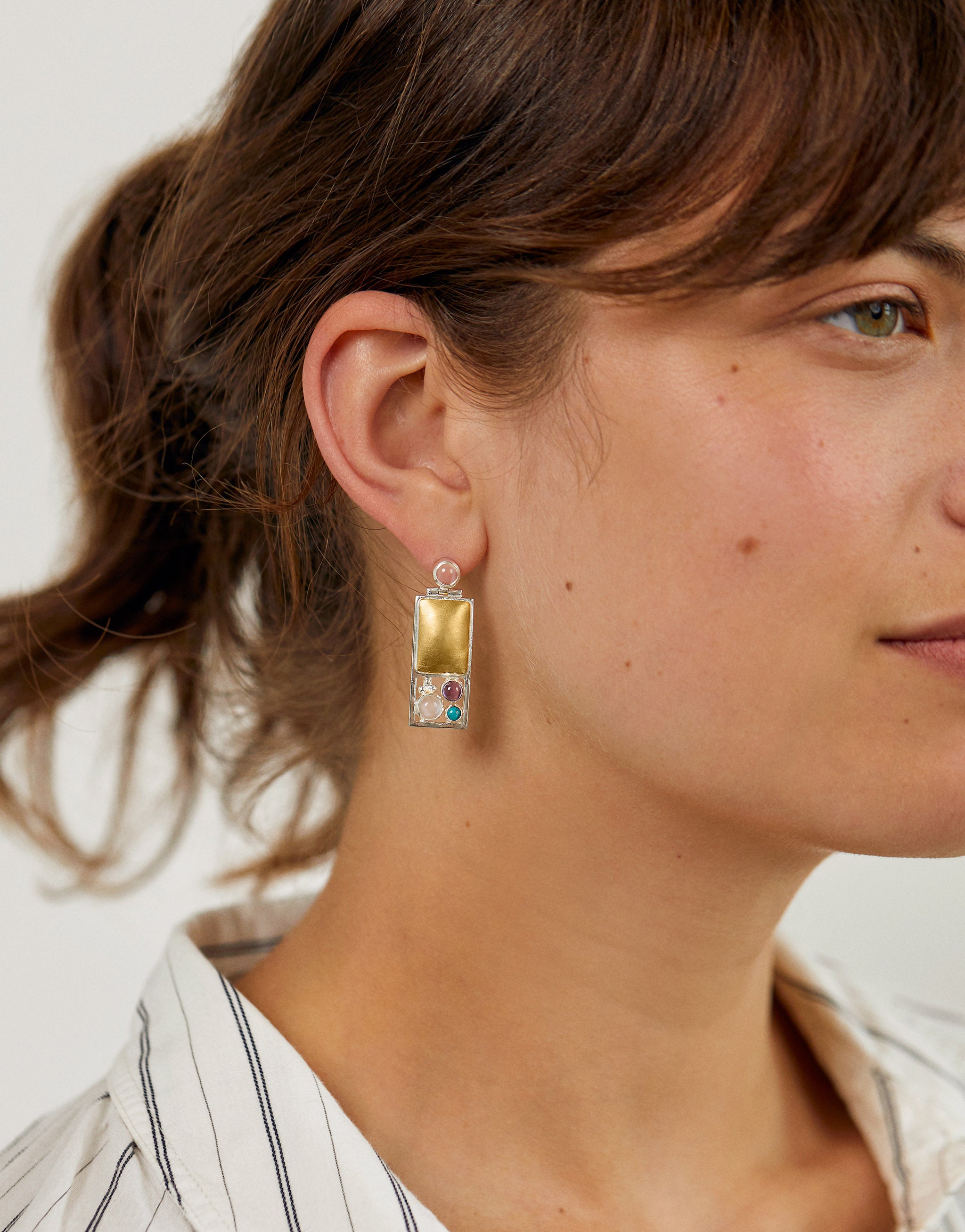 Viennese art-inspired Hoffmann earrings in silver and gold with turquoise, iolite and moonstone.