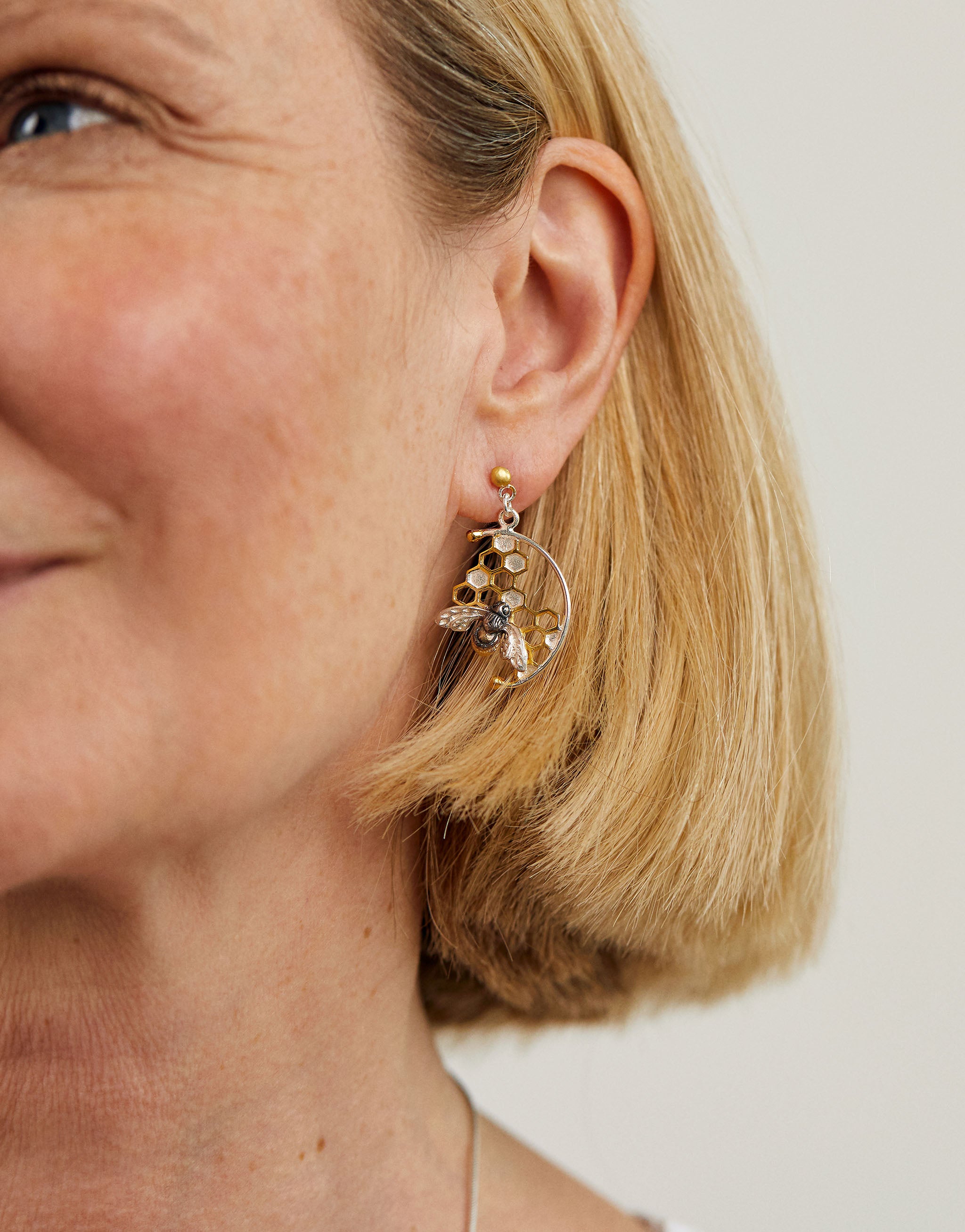 Honeycomb earrings in sterling silver with gold-plated honeybee and oxidised detail.