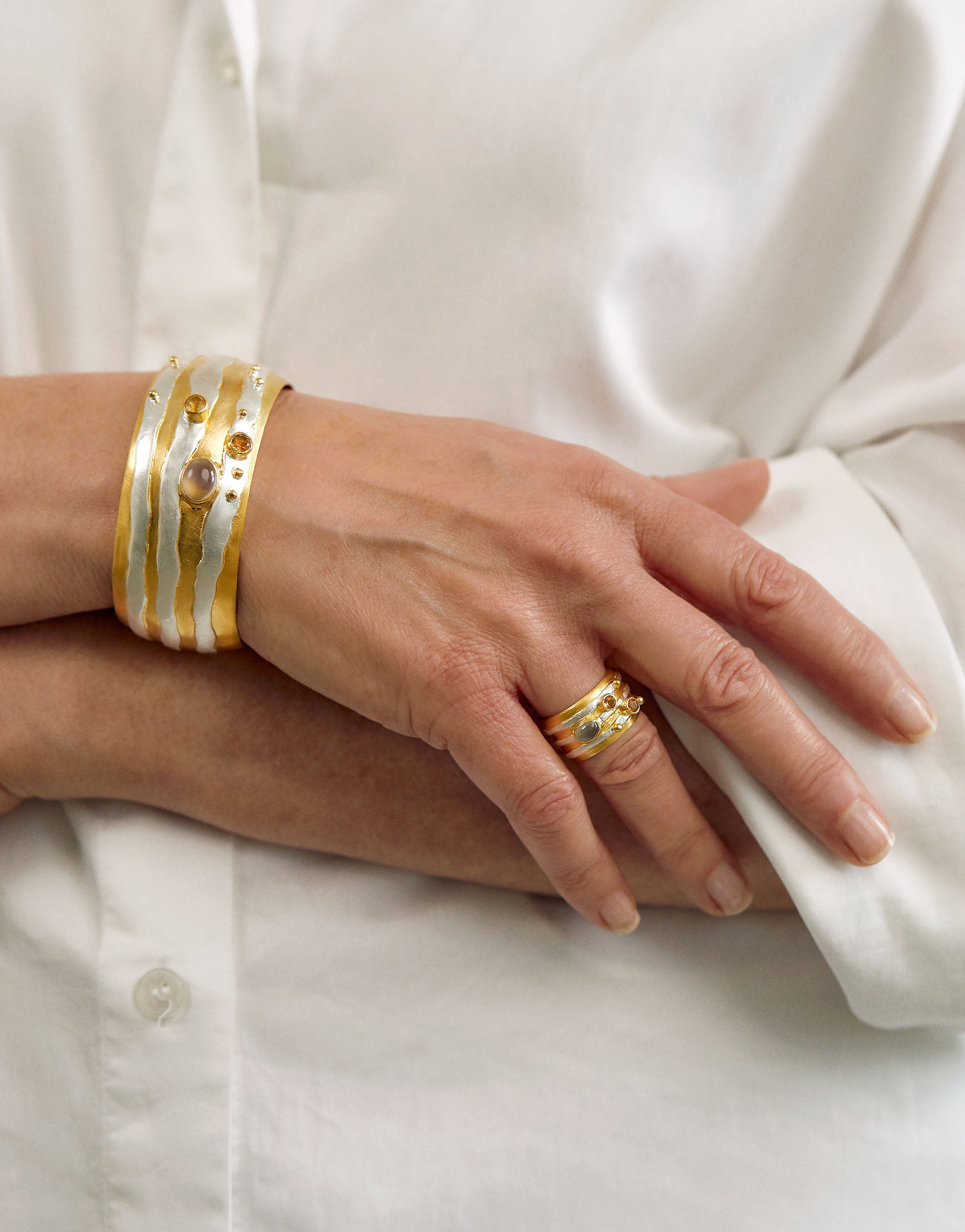 Jupiter jewellery set with sterling silver ring and bangle, 18ct gold plate, moonstone and citrine.