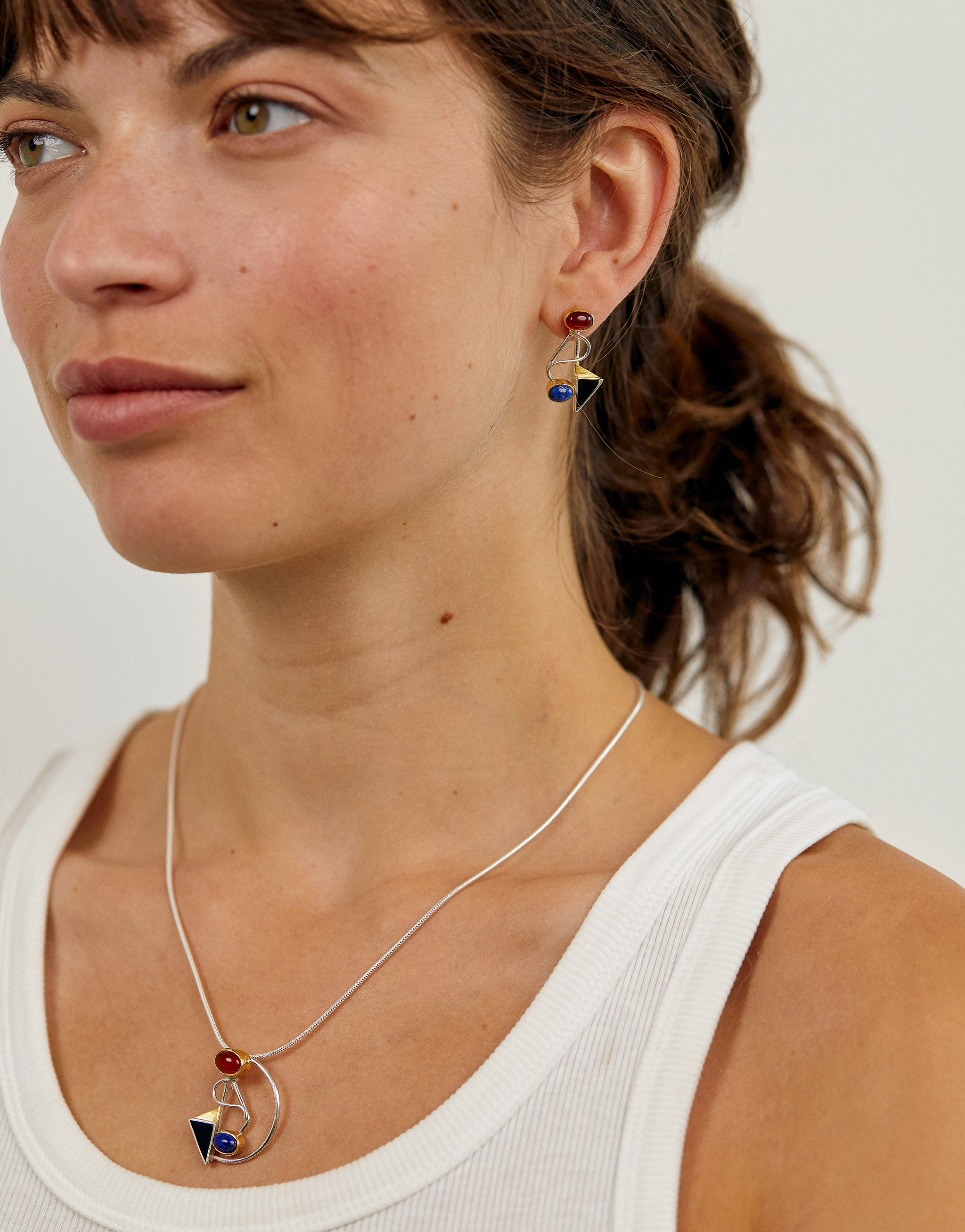 Art-inspired Kandinsky necklace with silver, gold accents, lapis lazuli, onyx and carnelian.