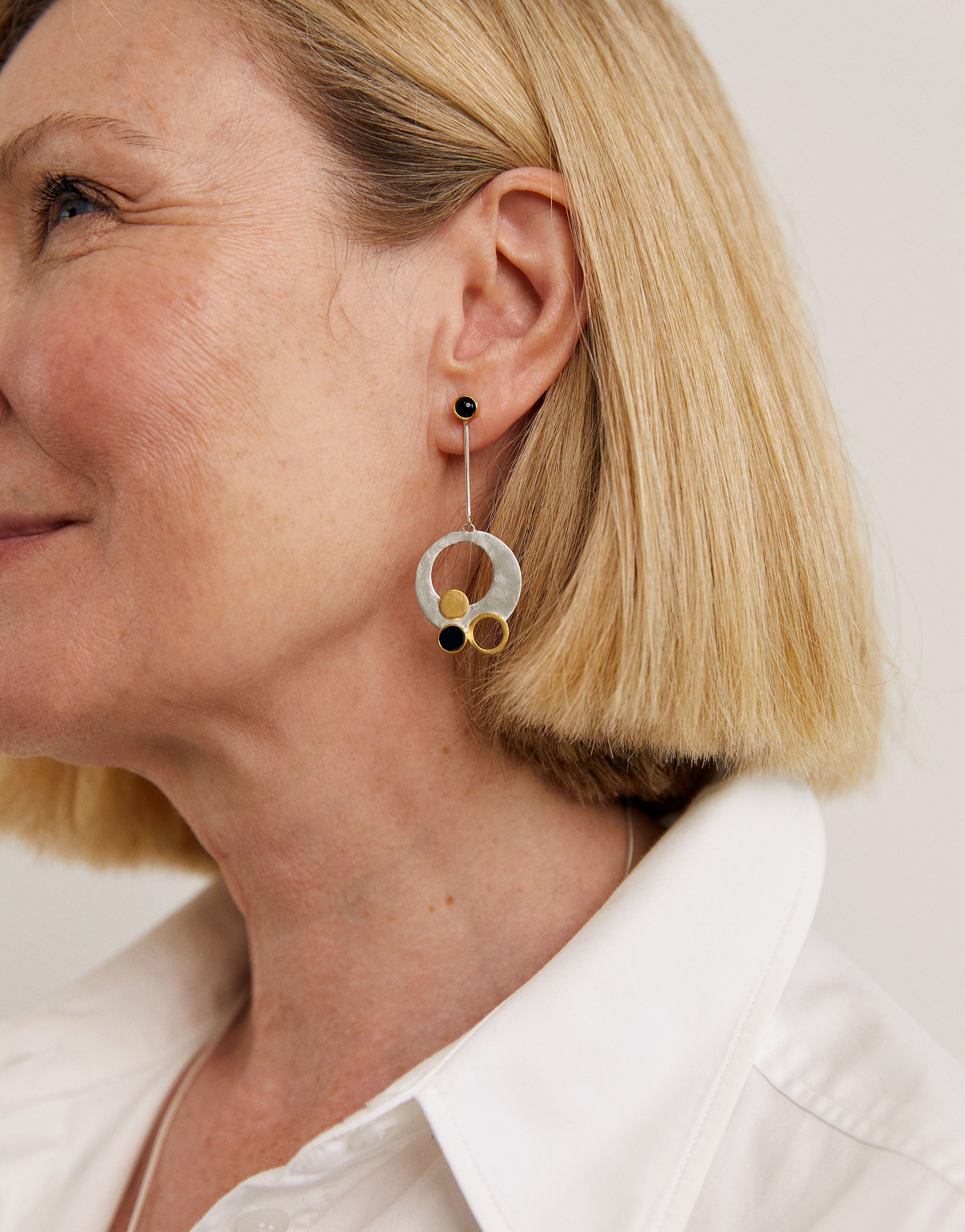 Gustav Klimt inspired statement earrings with silver, gold accents and onyx gemstone.