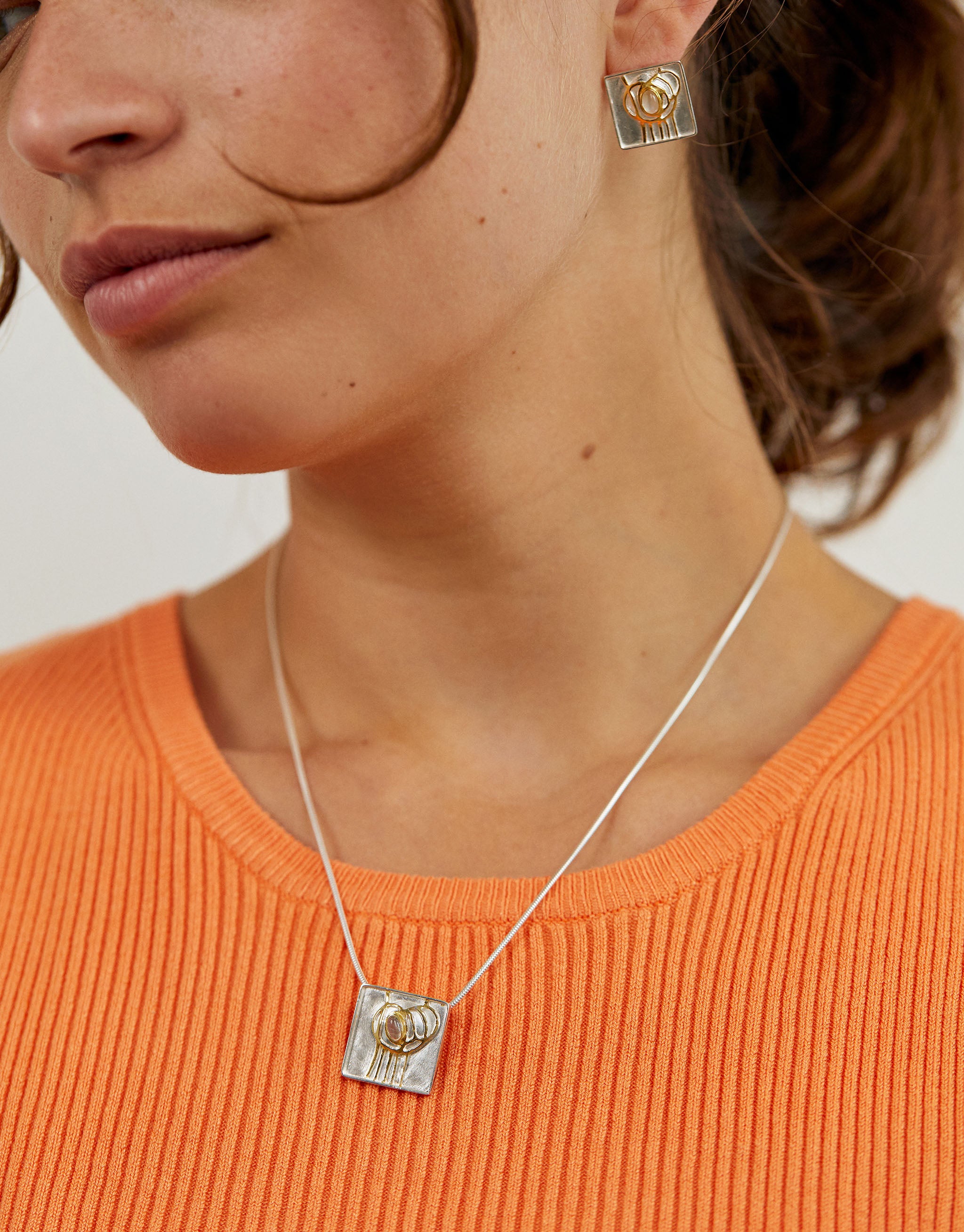 Sterling silver and gold-plated Mackintosh jewellery set with moonstone gemstones.