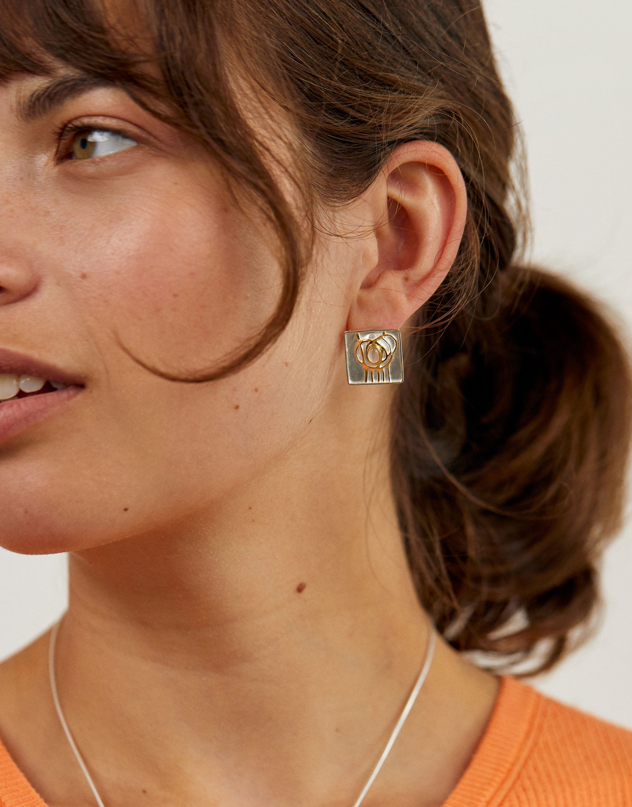 Art Nouveau inspired Mackintosh earrings with silver, gold accents and moonstone gemstone.