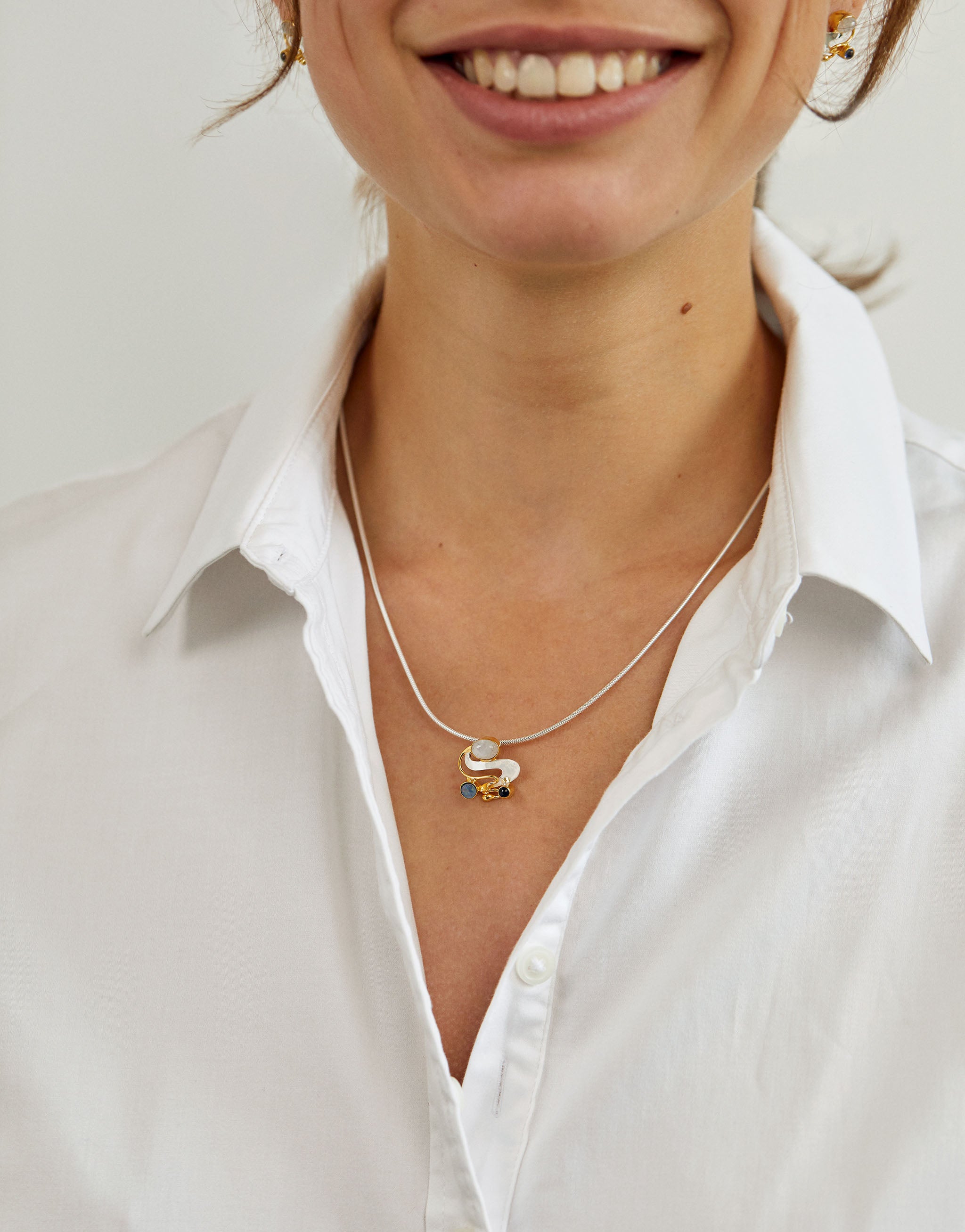 Claude Monet inspired pendant necklace with silver, gold accents, opal, iolite and moonstone gemstones.