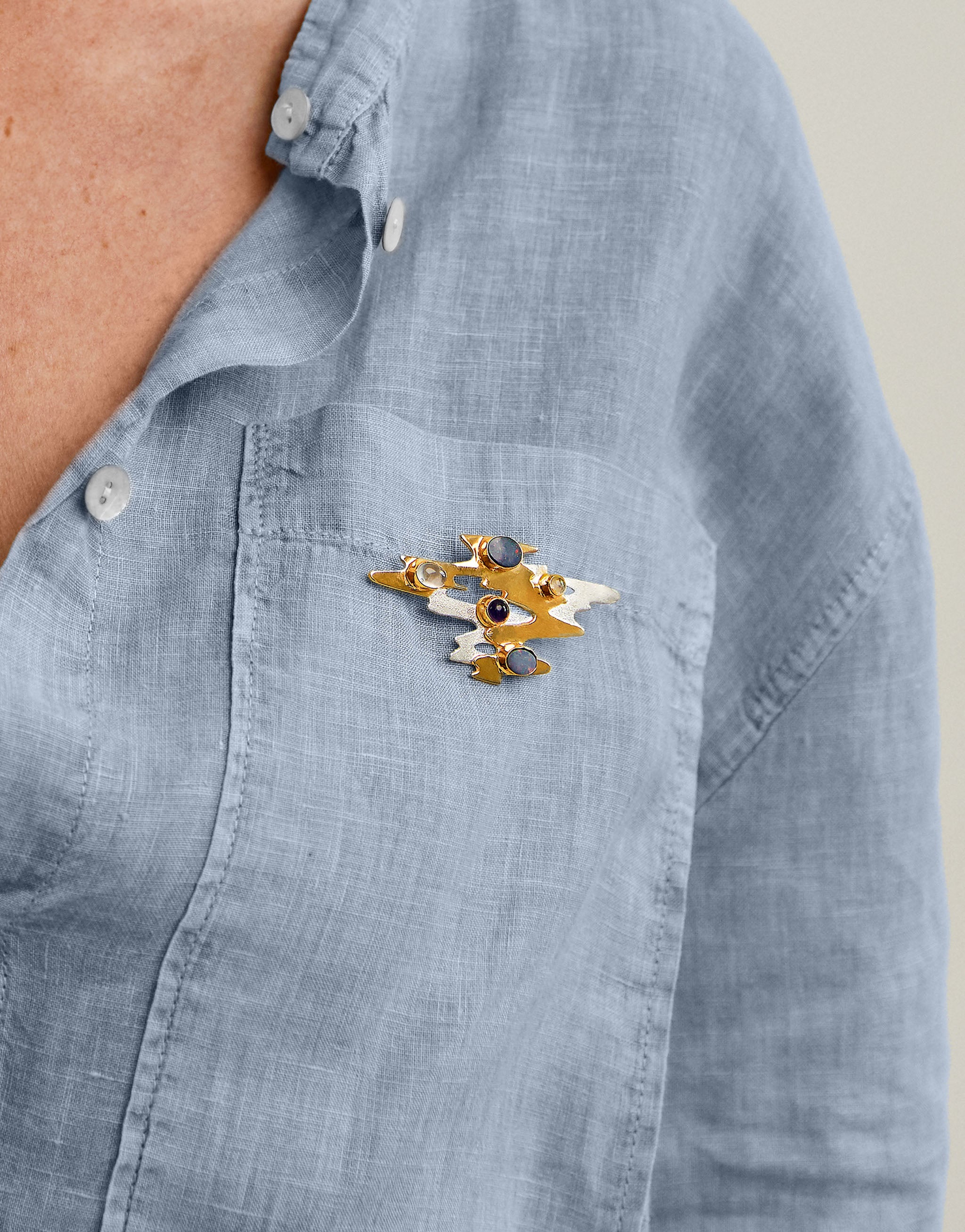 Claude Monet inspired brooch with silver and gold design featuring opal, moonstone and amethyst.