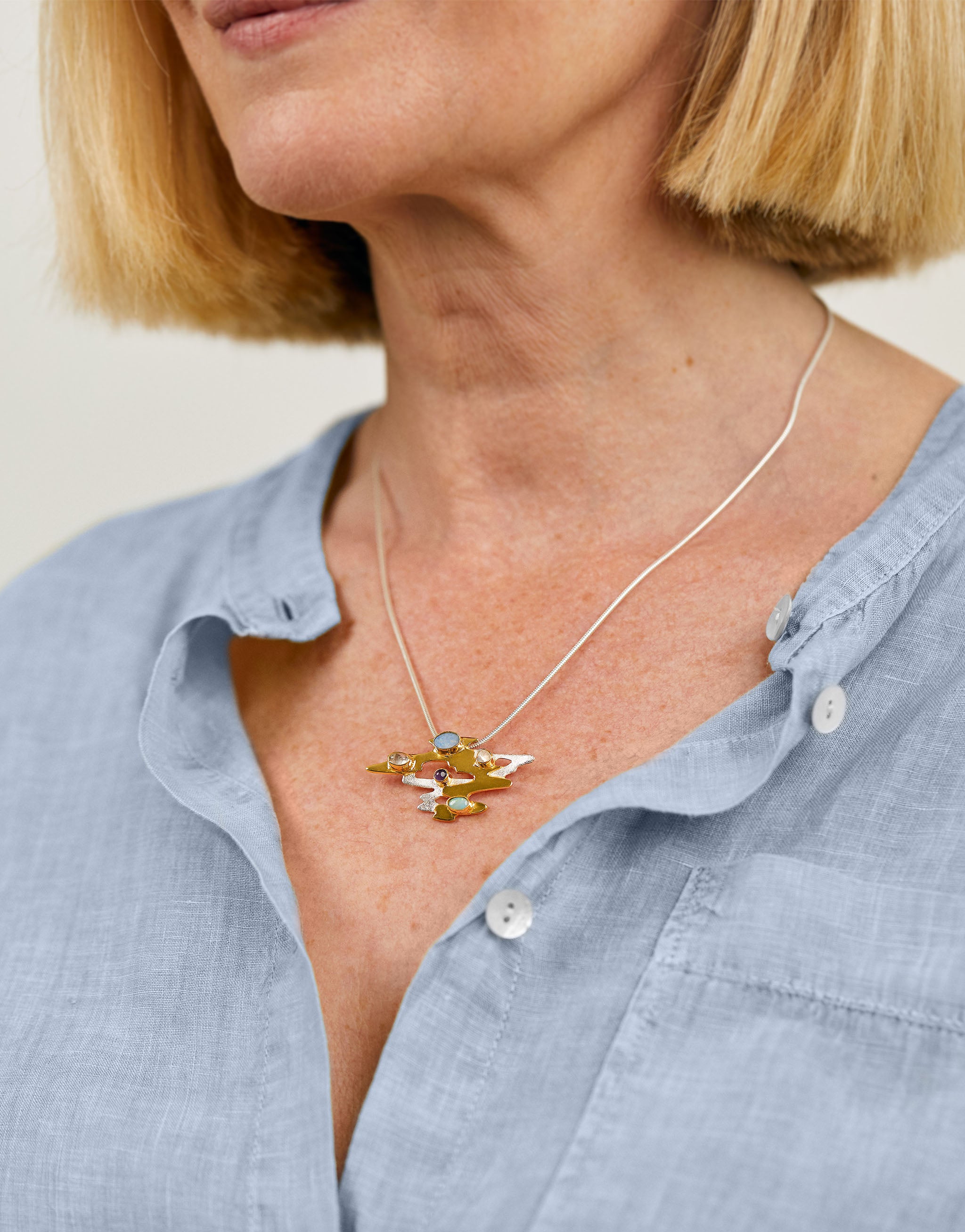 Claude Monet inspired necklace with silver, gold accents, opal, moonstone and amethyst gemstones.