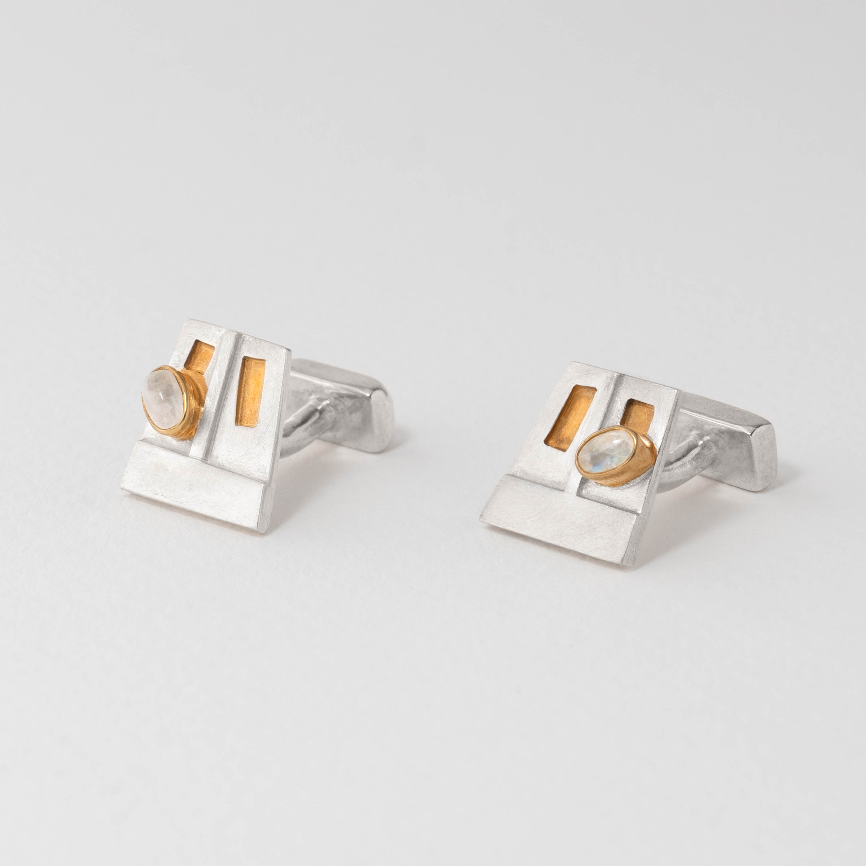 Charles Rennie Mackintosh inspired cufflinks in sterling silver with 18ct gold plated accents, echoing the wood and glass designs of the Willow Tea Rooms.