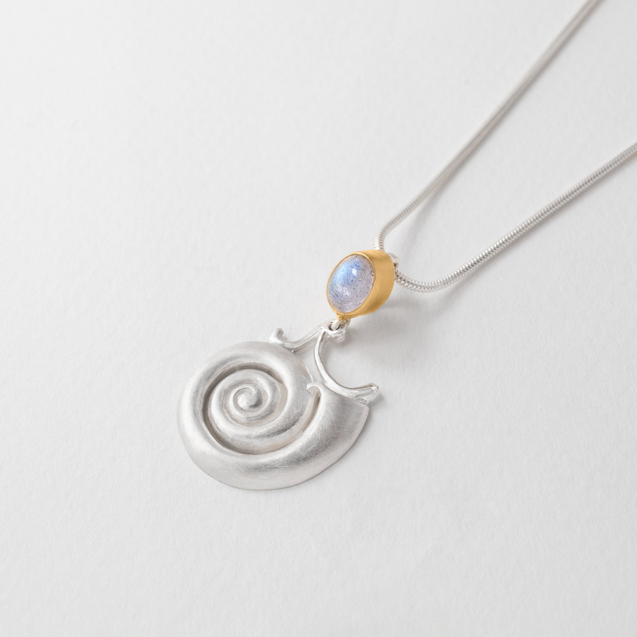 Silver moon shell pendant necklace with blue moonstone