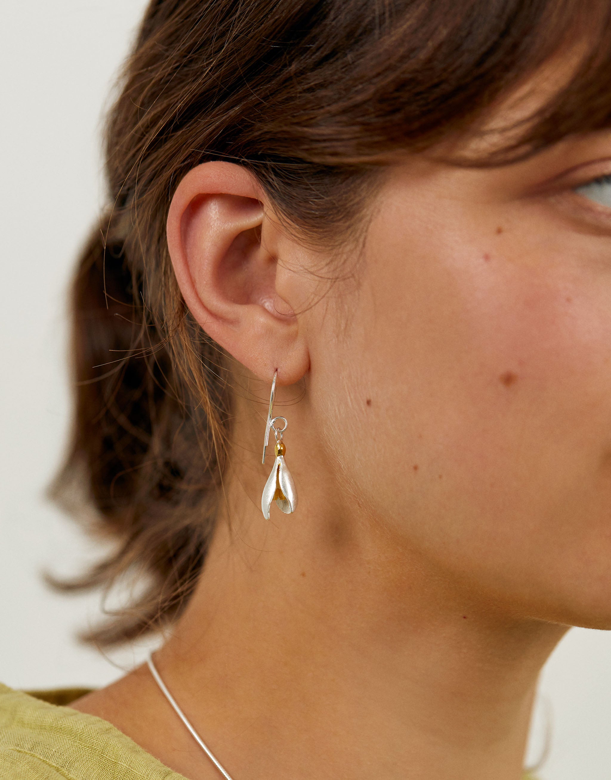 Snowdrop flower earrings in silver and gold.