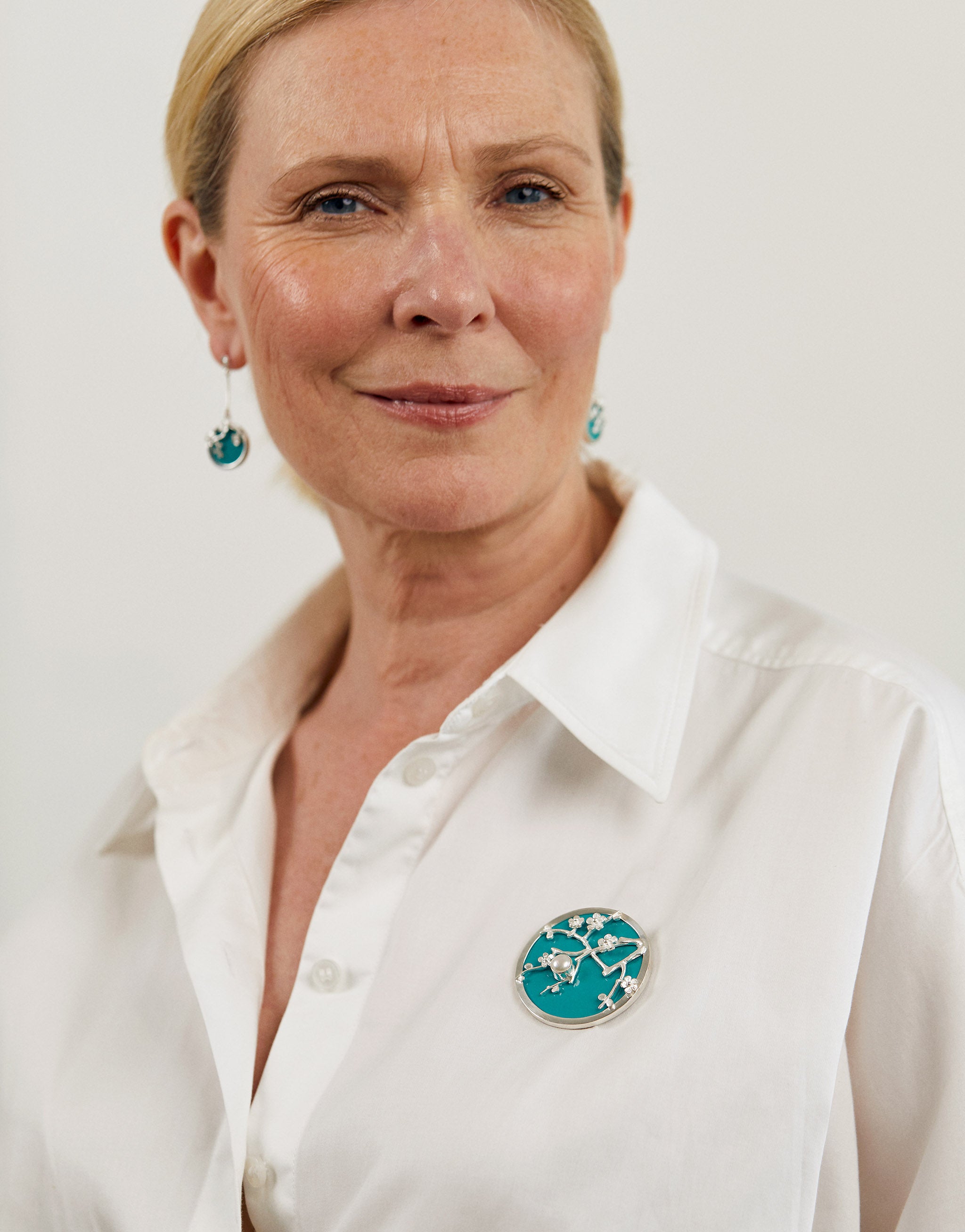 Van Gogh almond blossom brooch finished in sterling 925 silver with pearl and vibrant blue resin.