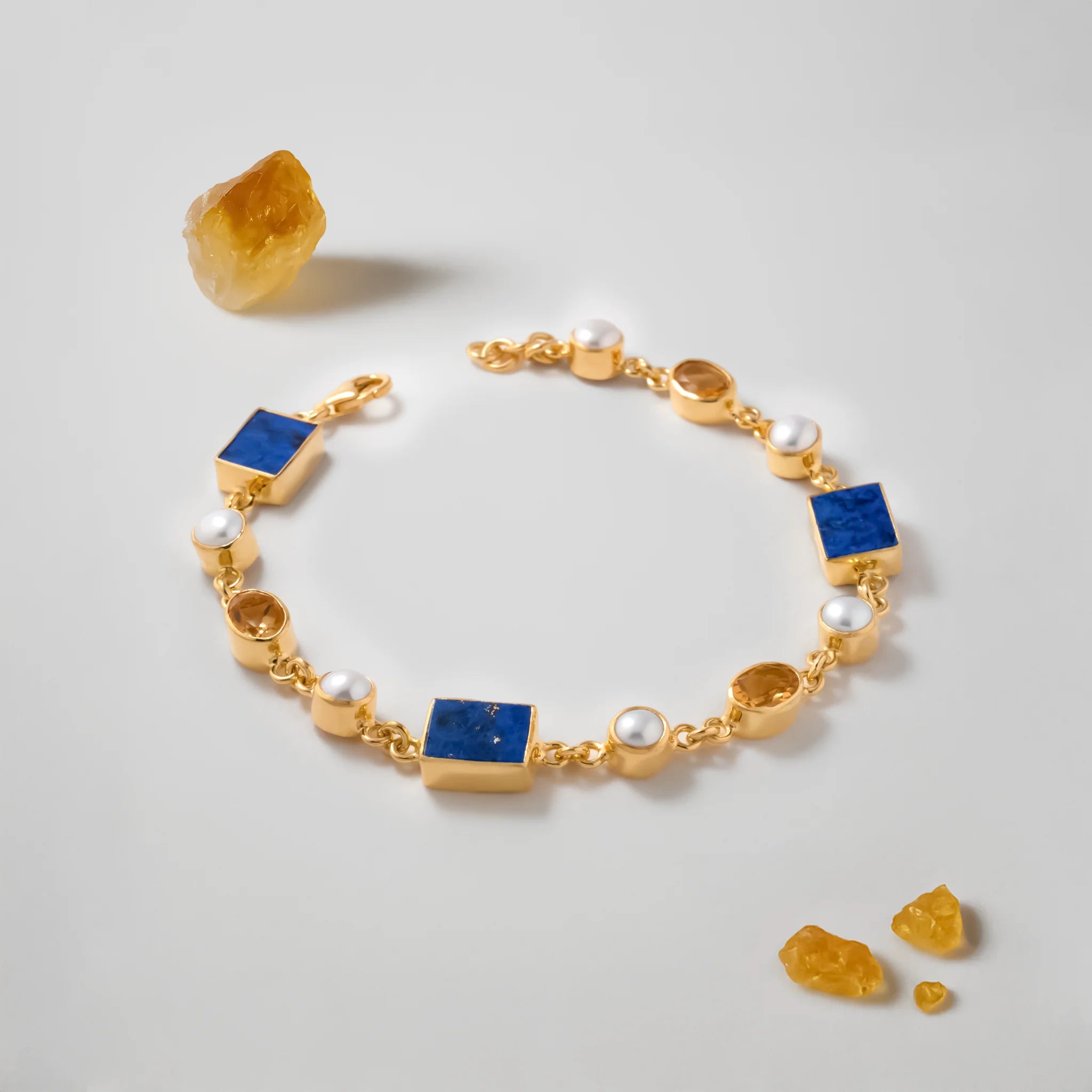 Birthstone jewellery by Paula Bolton featuring the Vermeer bracelet with pearl and citrine stones for June and November birthstones.