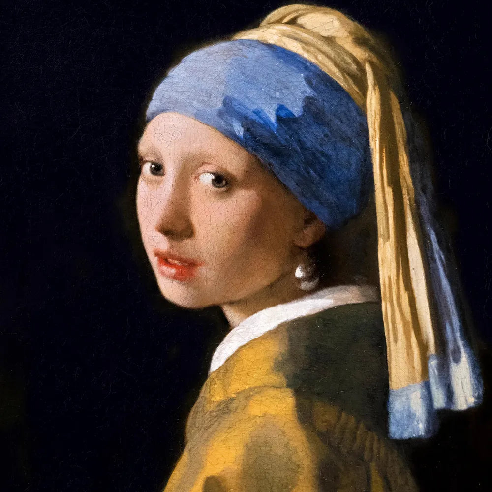 Painting of a young girl with a pearl earring by Johannes Vermeer