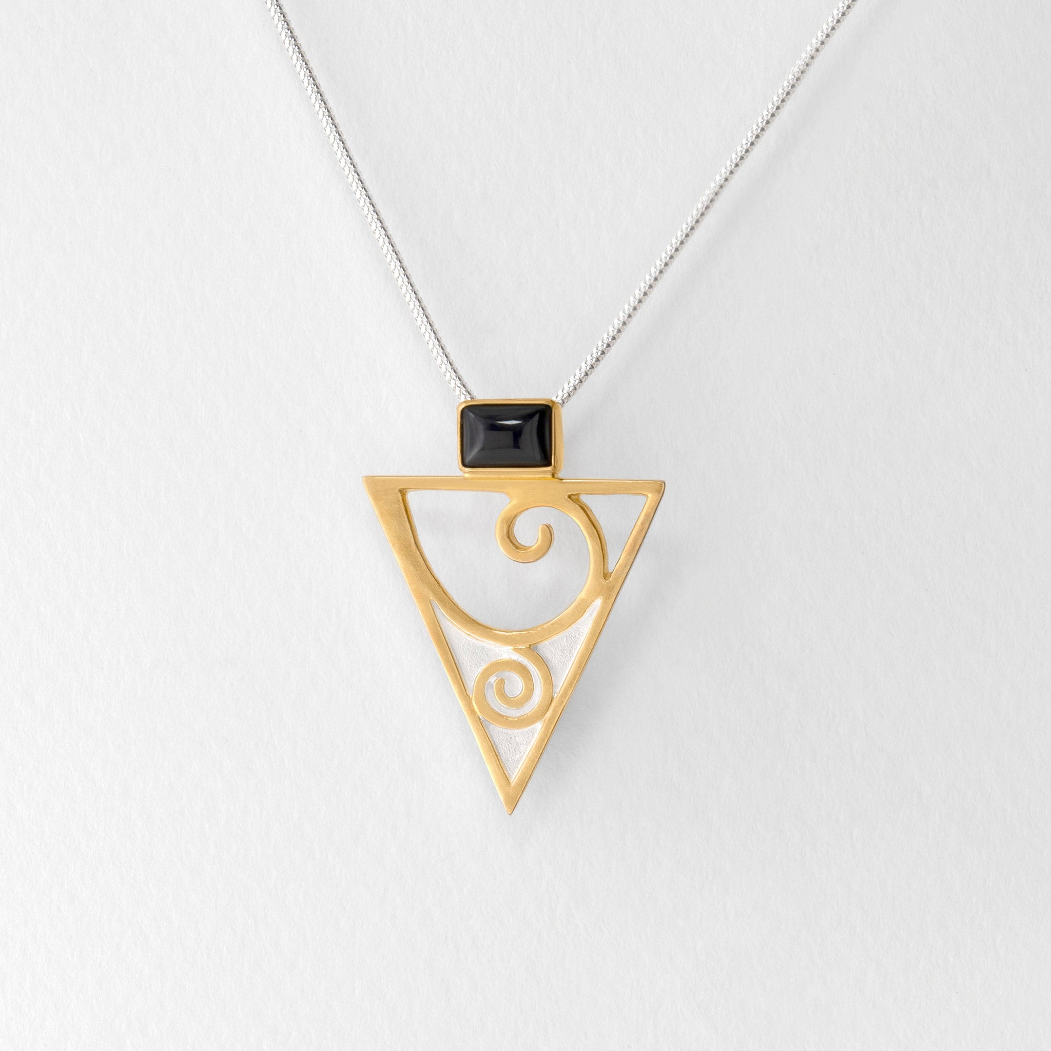 Silver and gold pendant necklace inspired by Gustav Klimt with black onyx gemstone.