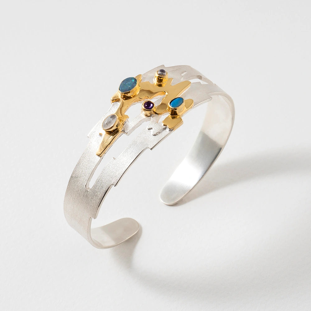 Silver and gold bracelet bangle with opals and moonstone gemstones