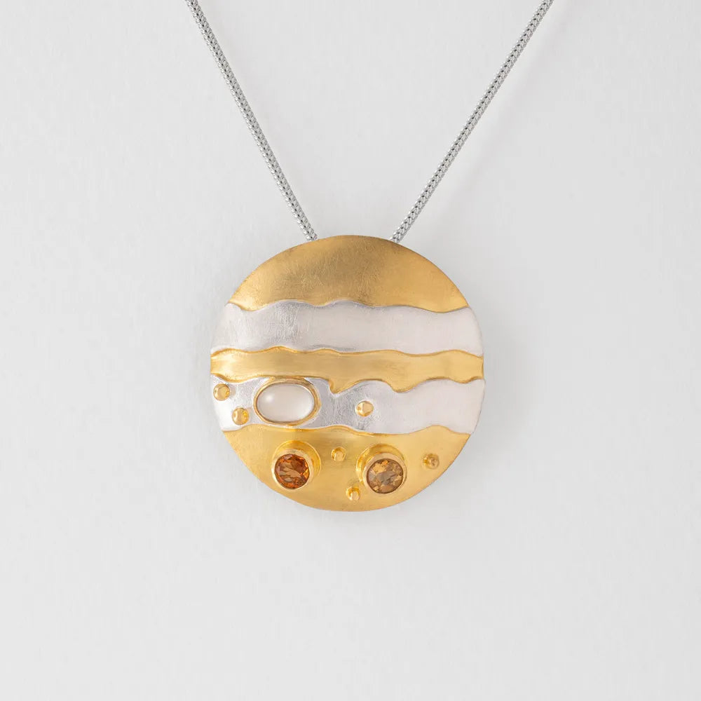 Popular Paula Bolton Jupiter space necklace featuring a November birthstone citrine.