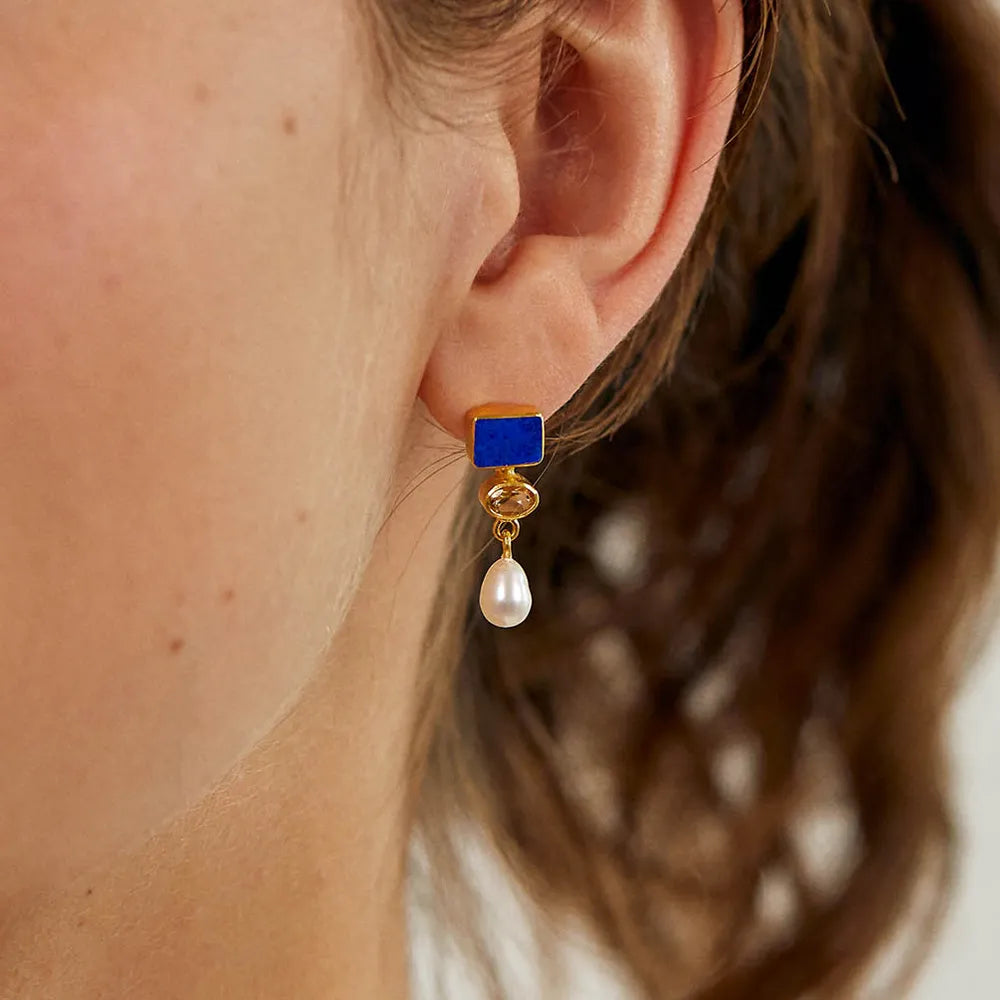 Johannes Vermeer inspired drop earring in gold, amber, blue and pearl tones.